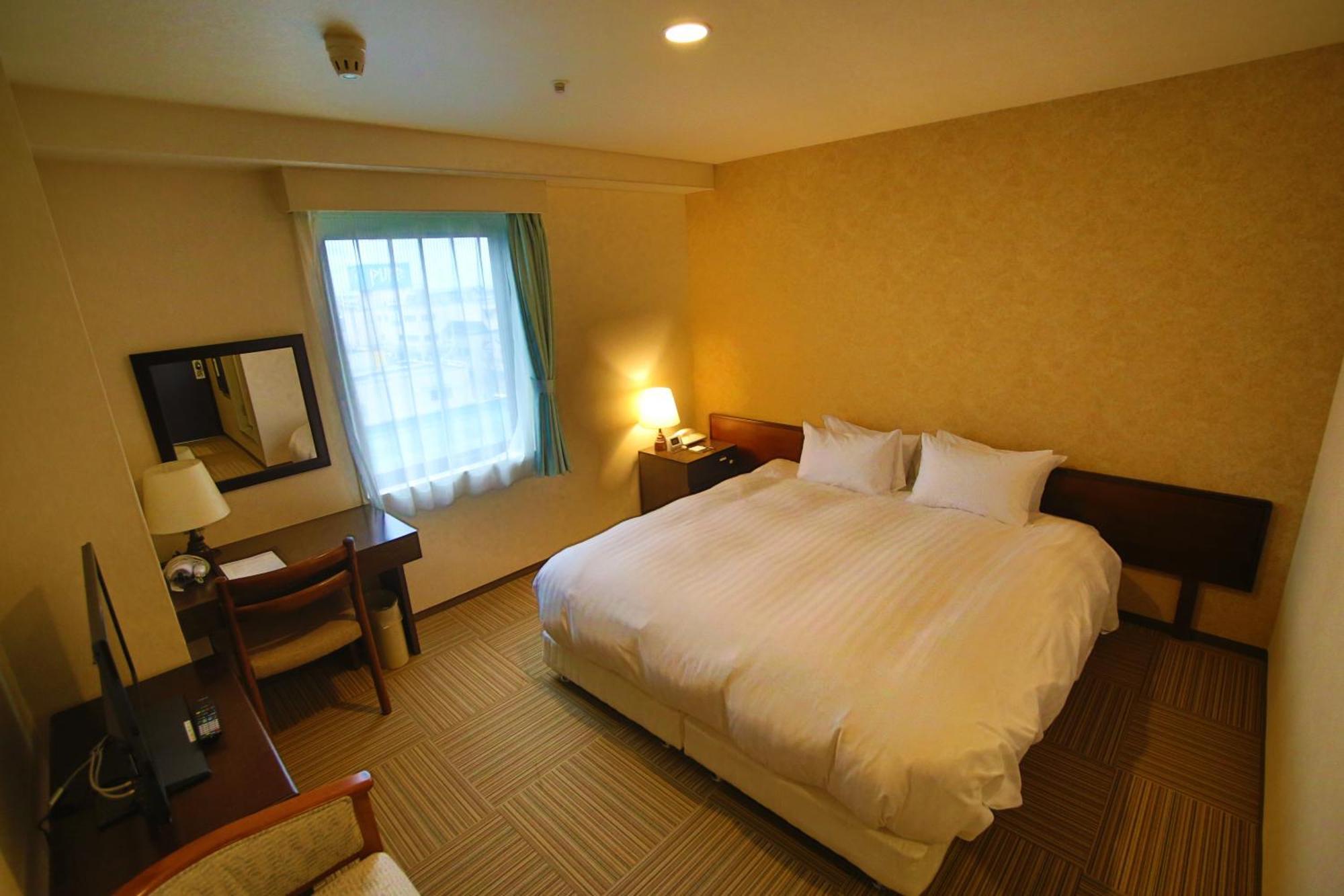 Shizunai Eclipse Hotel Синхидака Номер фото