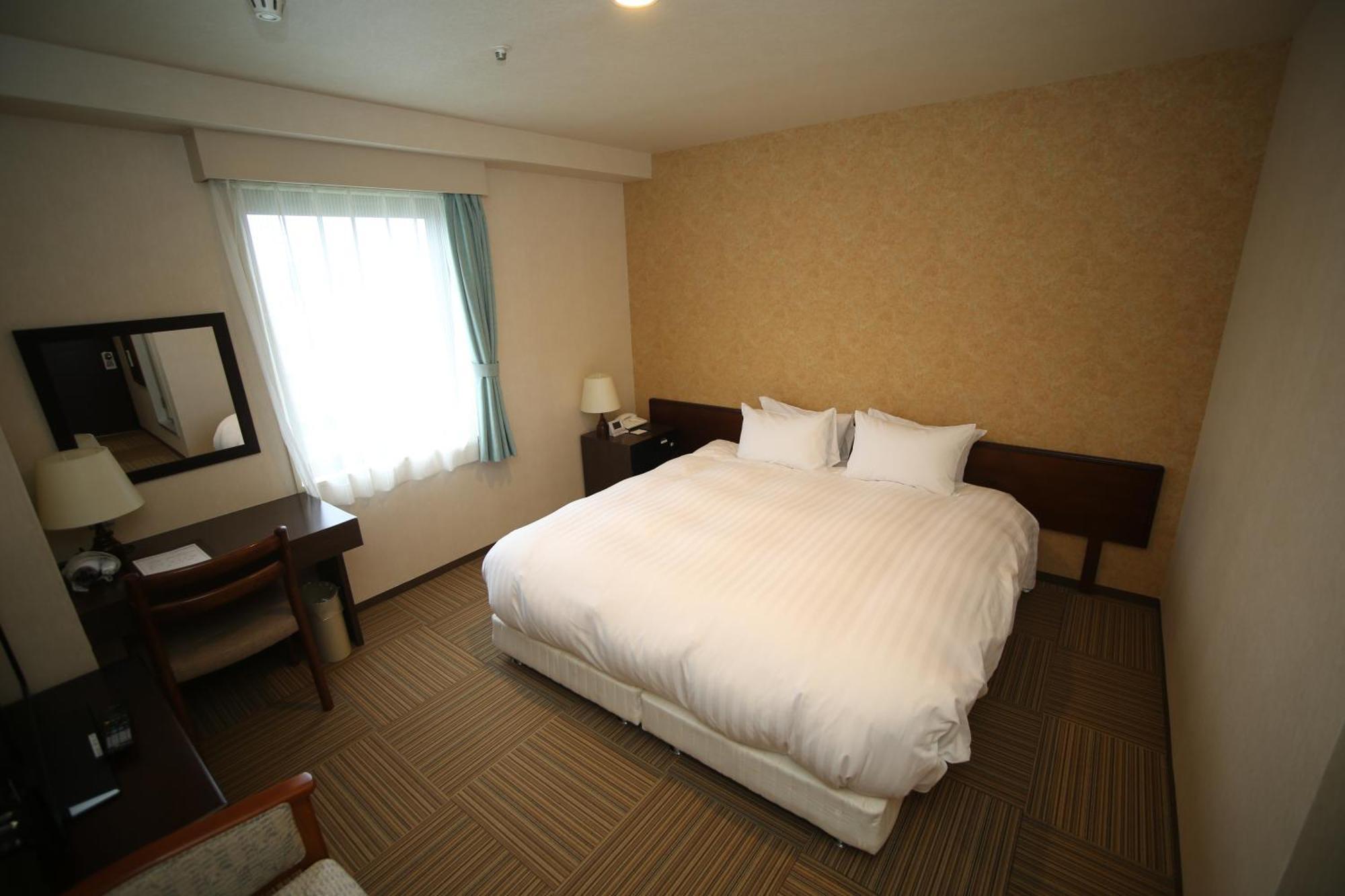 Shizunai Eclipse Hotel Синхидака Номер фото