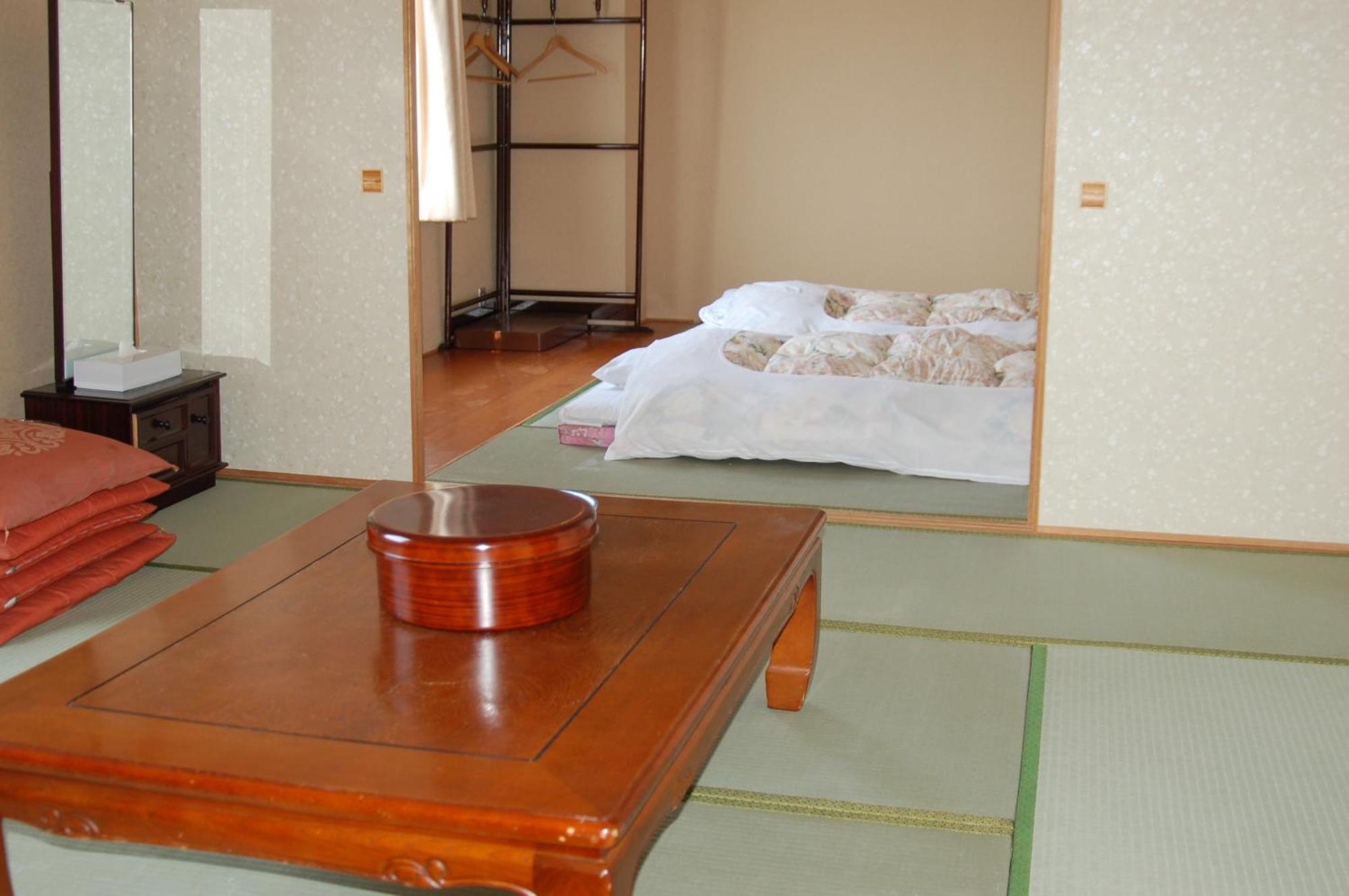 Shizunai Eclipse Hotel Синхидака Номер фото
