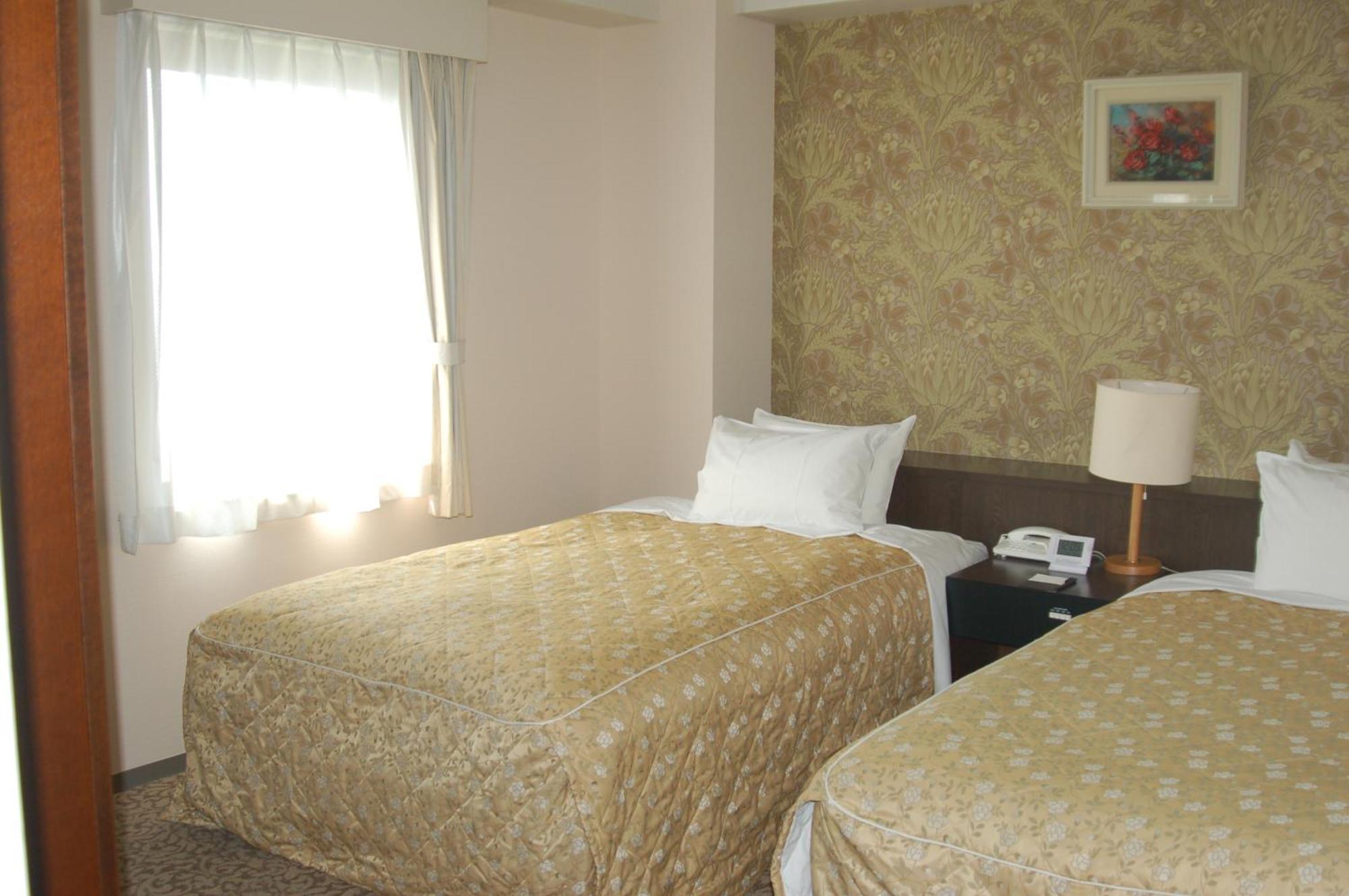 Shizunai Eclipse Hotel Синхидака Номер фото