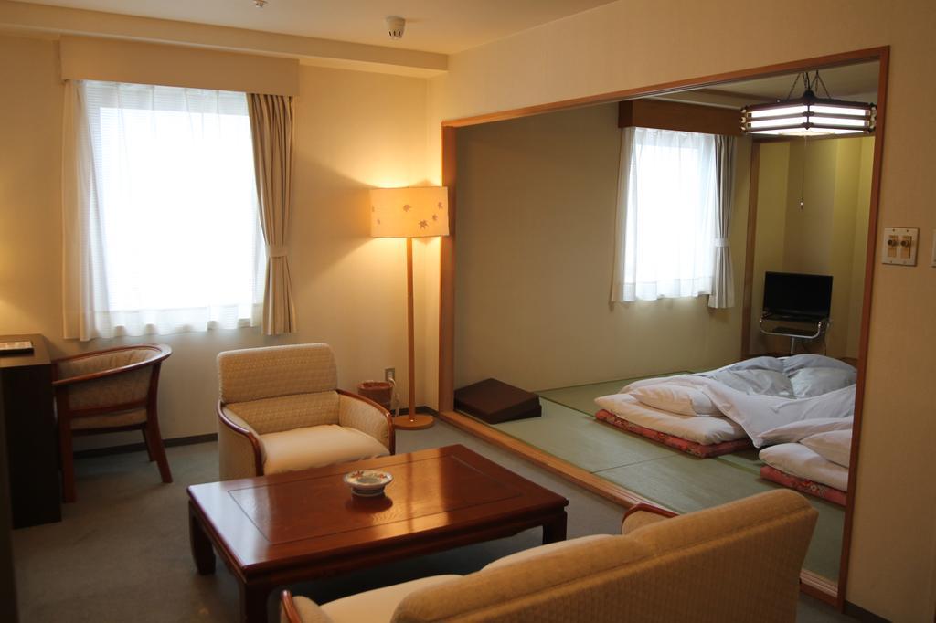 Shizunai Eclipse Hotel Синхидака Экстерьер фото