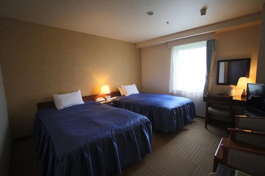 Shizunai Eclipse Hotel Синхидака Номер фото